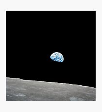 Earth rising above the lunar horizon. Photographic Print
