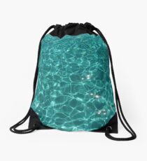 sun flares in seawater Drawstring Bag