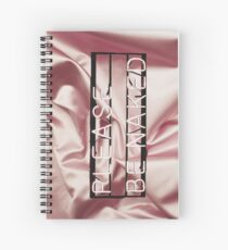 Be naked. Spiral Notebook