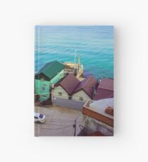 Many color houses on the coast of the sea Hardcover Journal