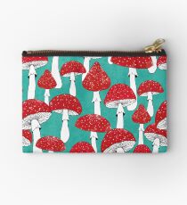 Red mushrooms on turquoise blue Studio Pouch