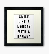 Smile like a monkey with a banana Framed Print