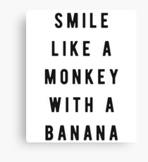 Smile like a monkey with a banana Canvas Print