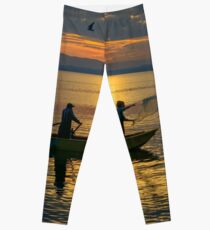 Casting nets in the sunset, Monte del Lago, Lago Trasimeno, Umbria, Italy Leggings