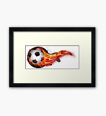 Soccer ball on fire Framed Print