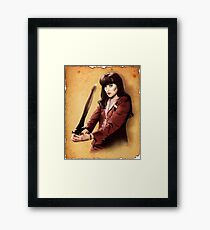 Xena scrolls Framed Print