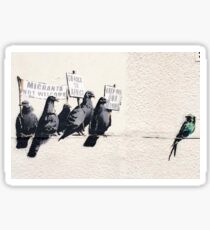 Banksy 'Migrants go home' graffiti art. Sticker