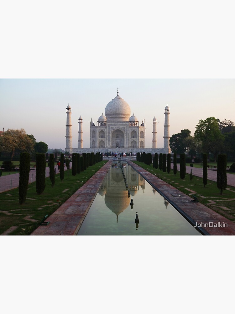 The Taj Mahal and reflective pool at dawn. by JohnDalkin