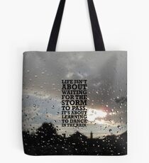 Life isn't about Waitin for the storm to pass. It's about Learning to Dance in the Rain Tote Bag