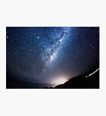 The Milky Way centre above a sleepy seaside town Photographic Print
