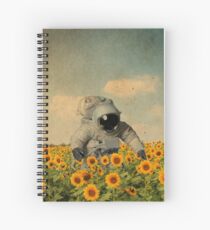 Astronaut in einem Sonnenblumenfeld Spiralblock