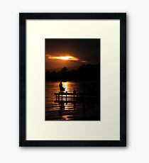 Fishing at dusk Framed Print