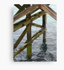 The old pier at Trefor Canvas Print