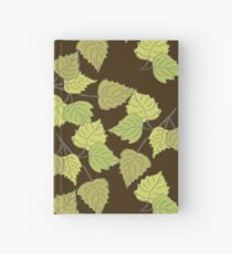 Birch leaves brown background Hardcover Journal