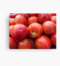 A pile of luscious bright red tomatoes Canvas Print