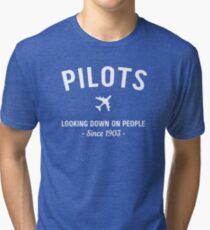 Pilots. Looking down on people Since 1903 Tri-blend T-Shirt