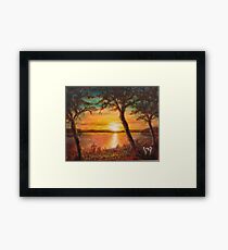 Sunset over the lake Framed Print