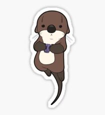 Cute otter holding a shell Sticker