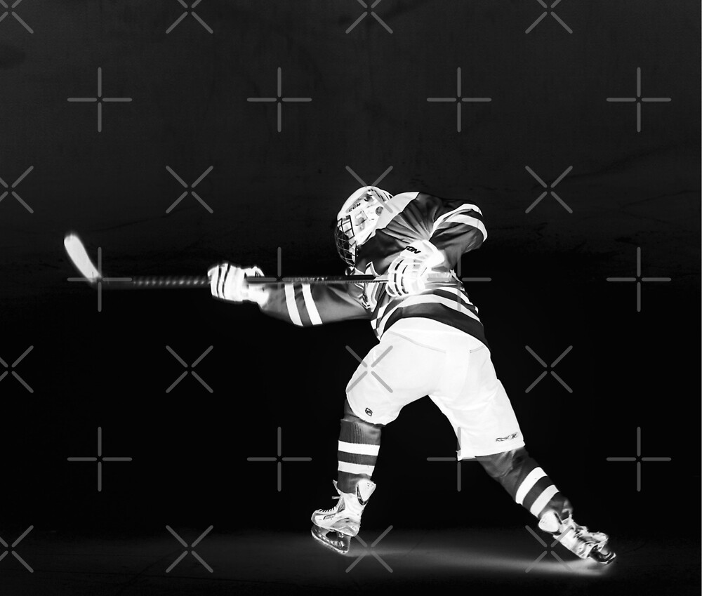 "wellknown ice hockey player hits the puck, hockey picture black and