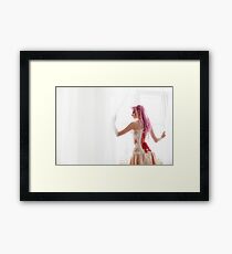 Freaky young female model wearing corset Framed Print