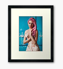 Freaky young female model wearing corset Framed Print