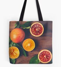 Still Life with Ripe Juicy Citrus Fruits Tote Bag