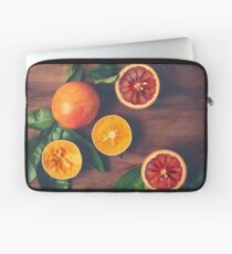 Still Life with Ripe Juicy Citrus Fruits Laptop Sleeve