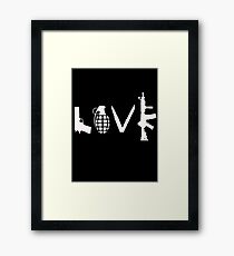 Love Guns Framed Print