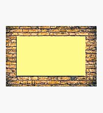 Brick wall with a billboard Photographic Print