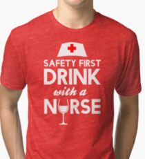 Safety first drink with a nurse Tri-blend T-Shirt