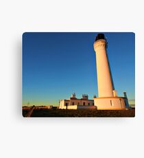 Sunrise over Covesea Skerries Lighthouse, Lossiemouth, Scotland. Canvas Print