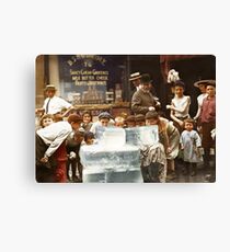Licking blocks of ice during heat wave in New York, July, 1911 Canvas Print