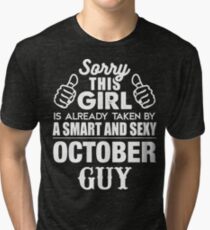 SORRY THIS GIRL IS ALREADY TAKEN BY A SMART AND SEXY OCTOBER GUY Tri-blend T-Shirt