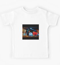 Mechanic soldering a muffler Kids Tee