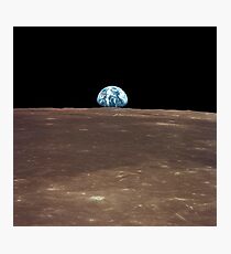 Earth rising above the Moon's horizon. Photographic Print