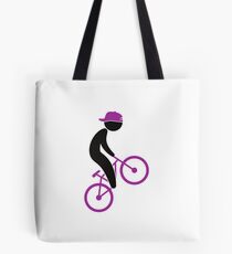 A cyclist doing tricks on his bike Tote Bag