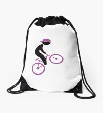 A cyclist doing tricks on his bike Drawstring Bag