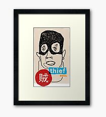 A thief Framed Print