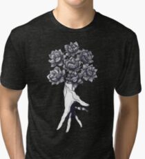 Hand with lotuses on black Vintage T-Shirt