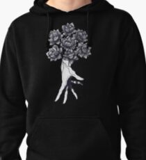 Hand with lotuses on black Pullover Hoodie