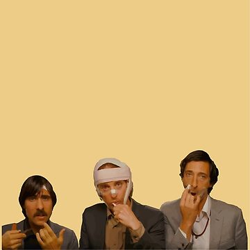 The Darjeeling Limited Wes Anderson wearing white suit and scarf