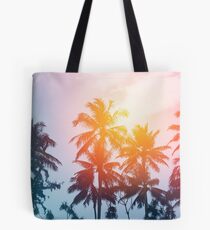 Beach sunset at the coast line Tote Bag