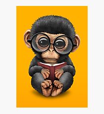 Cute Baby Chimpanzee Reading a Book on Yellow Photographic Print