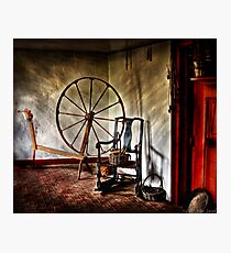 Spinning wheel and a chair Photographic Print
