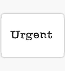 A close up image of the word "urgent" from a typewriter Sticker