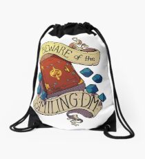 Beware of the Smiling Dungeon Master Drawstring Bag