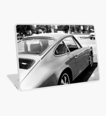 Porsche Cruising down Museum District Laptop Skin