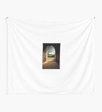Through the arched door Wall Tapestry
