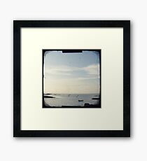 Boat on the ocean Framed Print