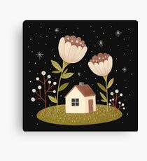 Tiny house among flowers Canvas Print